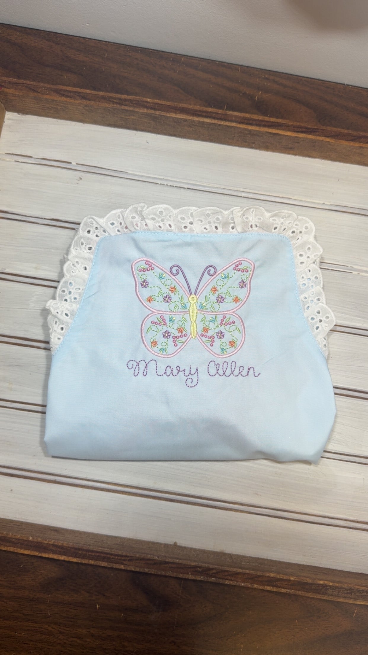 Monogramed eyelet sun suit