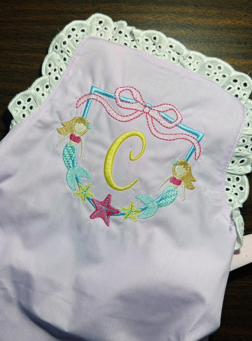 Monogramed eyelet sun suit