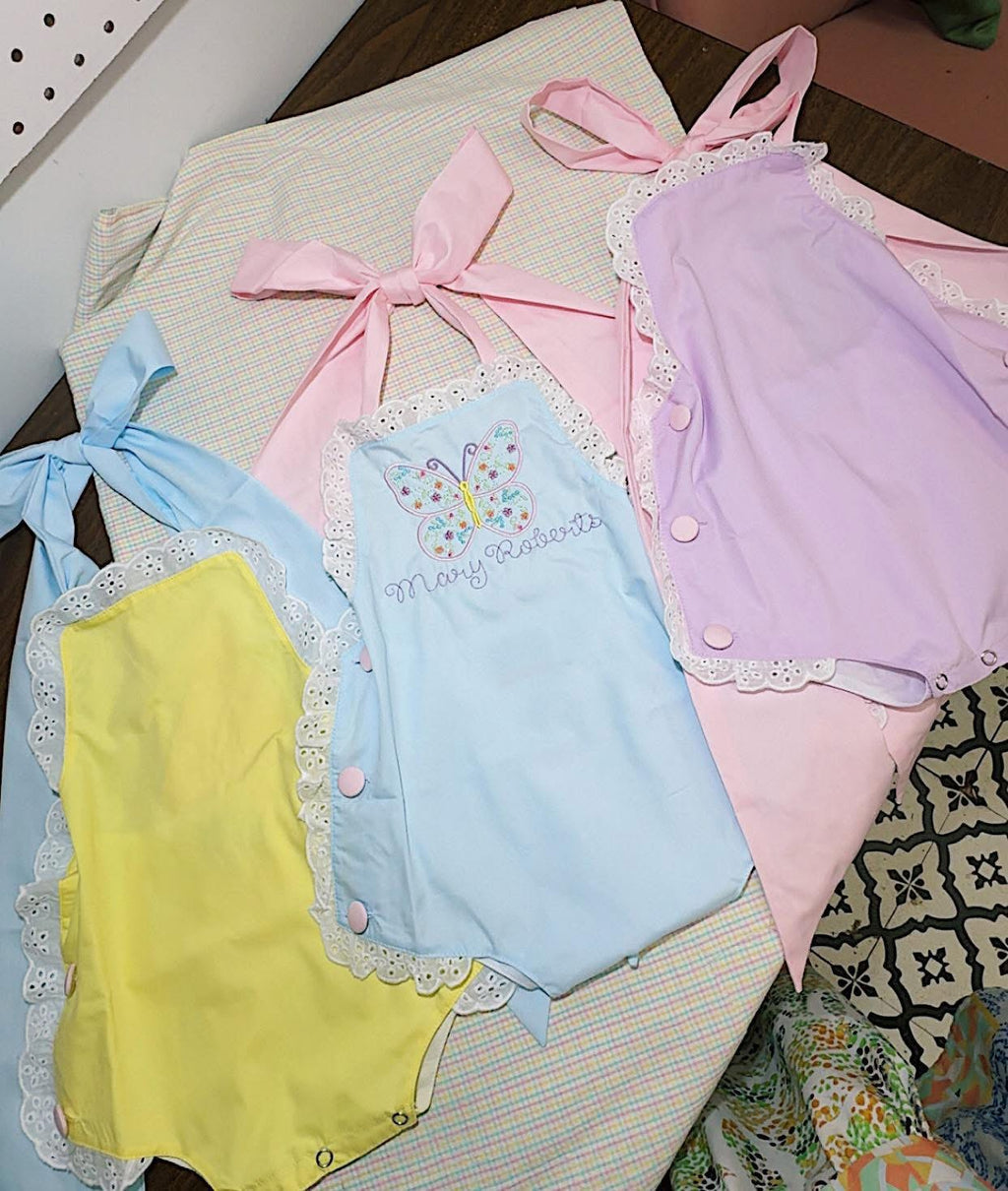 Monogramed eyelet sun suit