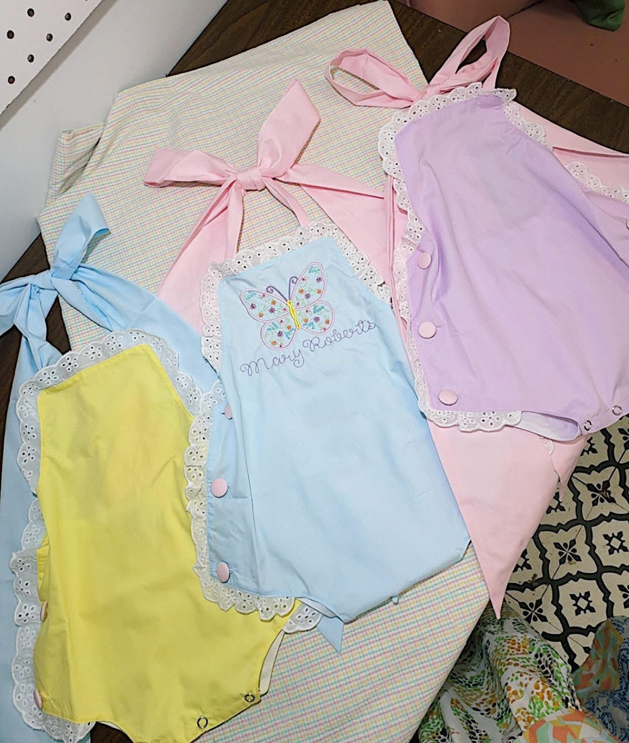 Monogramed eyelet sun suit