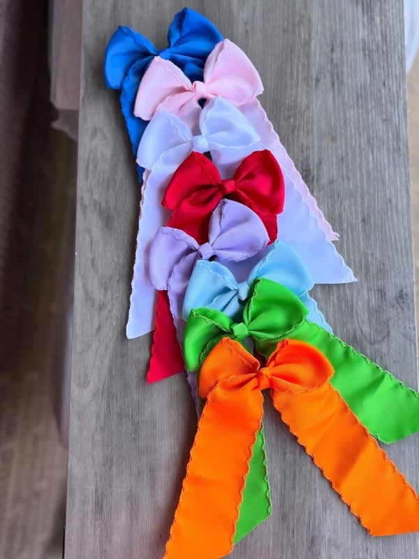 Monogramed scalloped bow