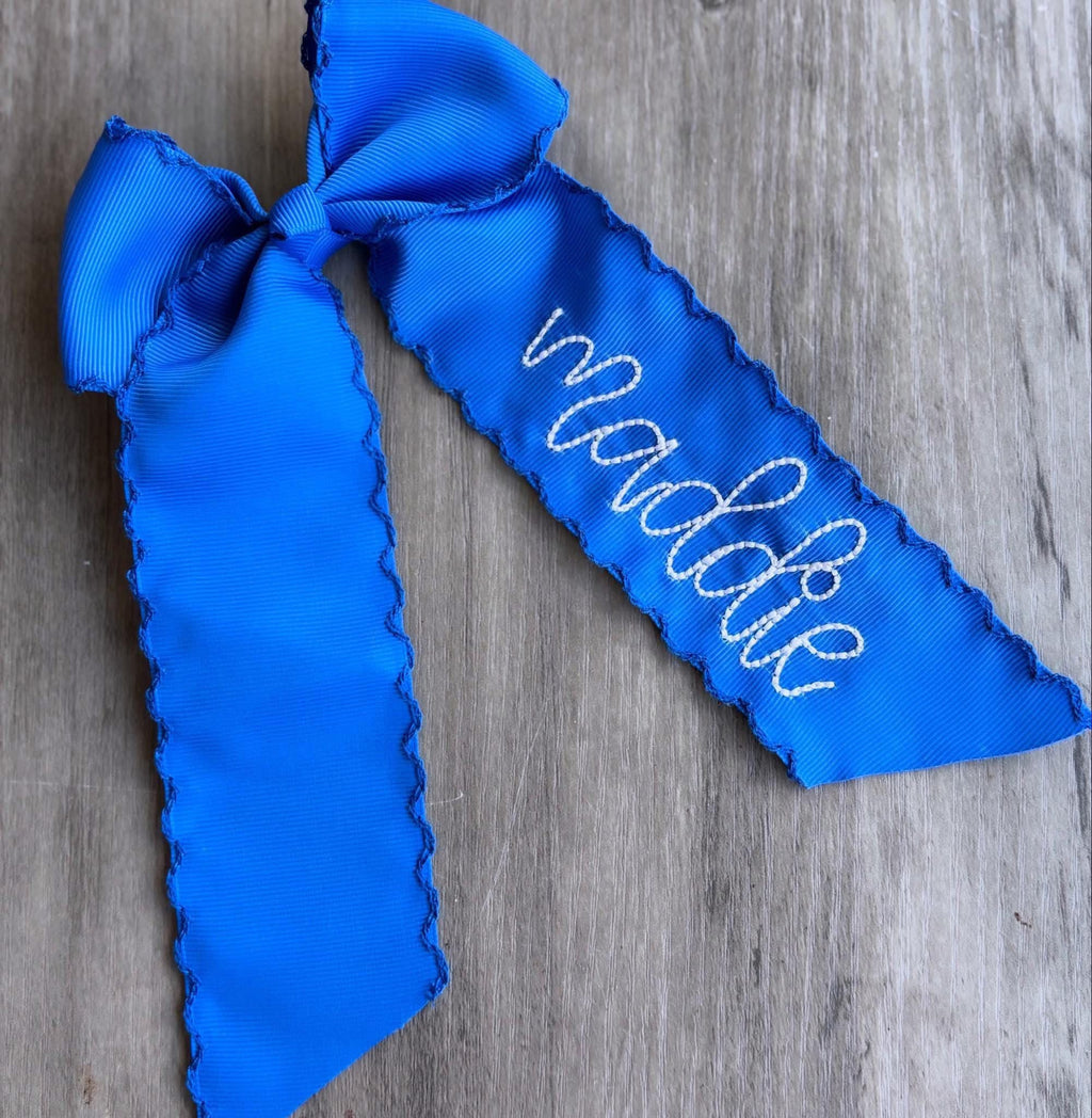 Monogramed scalloped bow