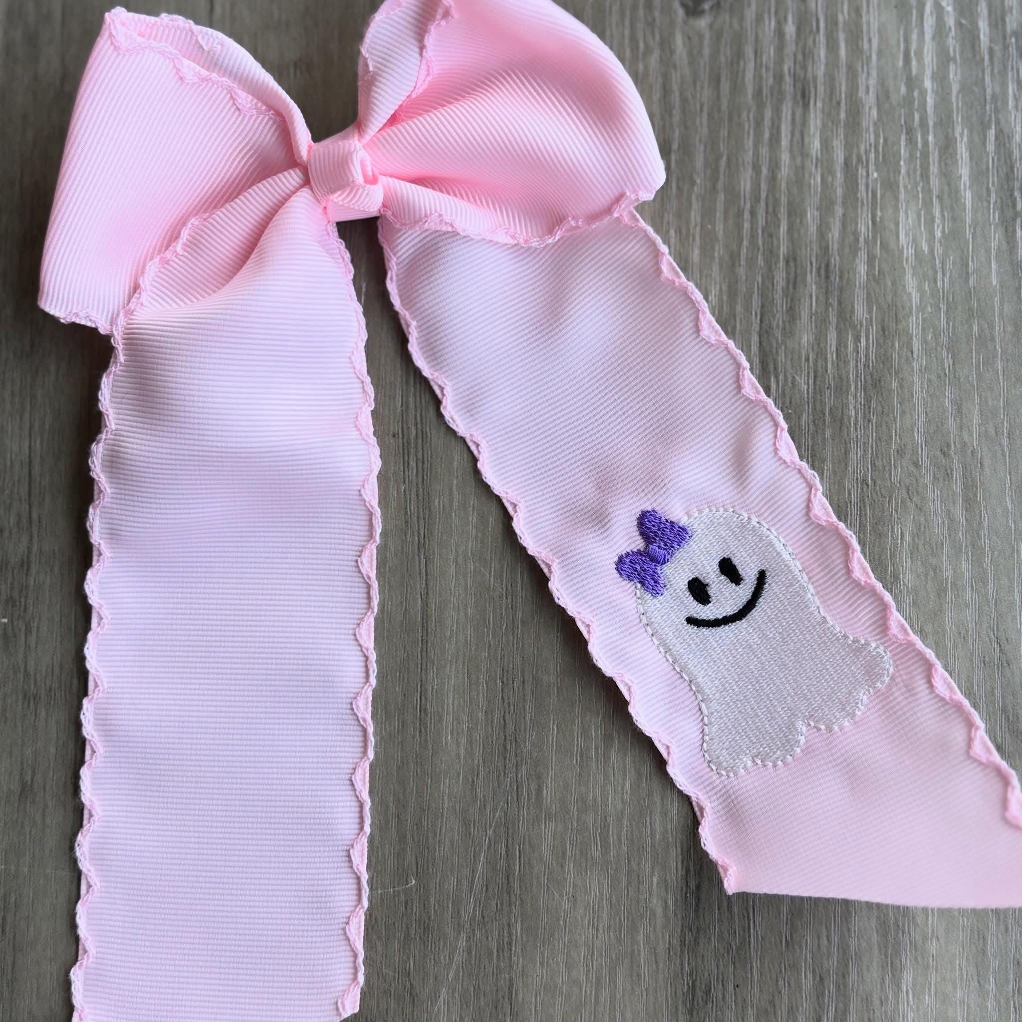 Monogramed scalloped bow